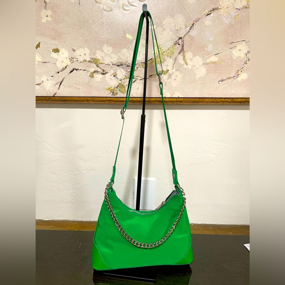 Small shoulder/crossbody bag. Nylon material; adjustable strap. Kelly Green.